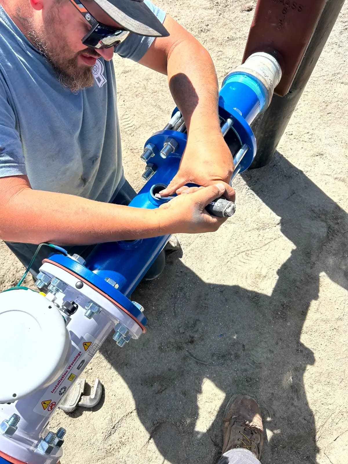 Mikey working on an Elite Pump water system
